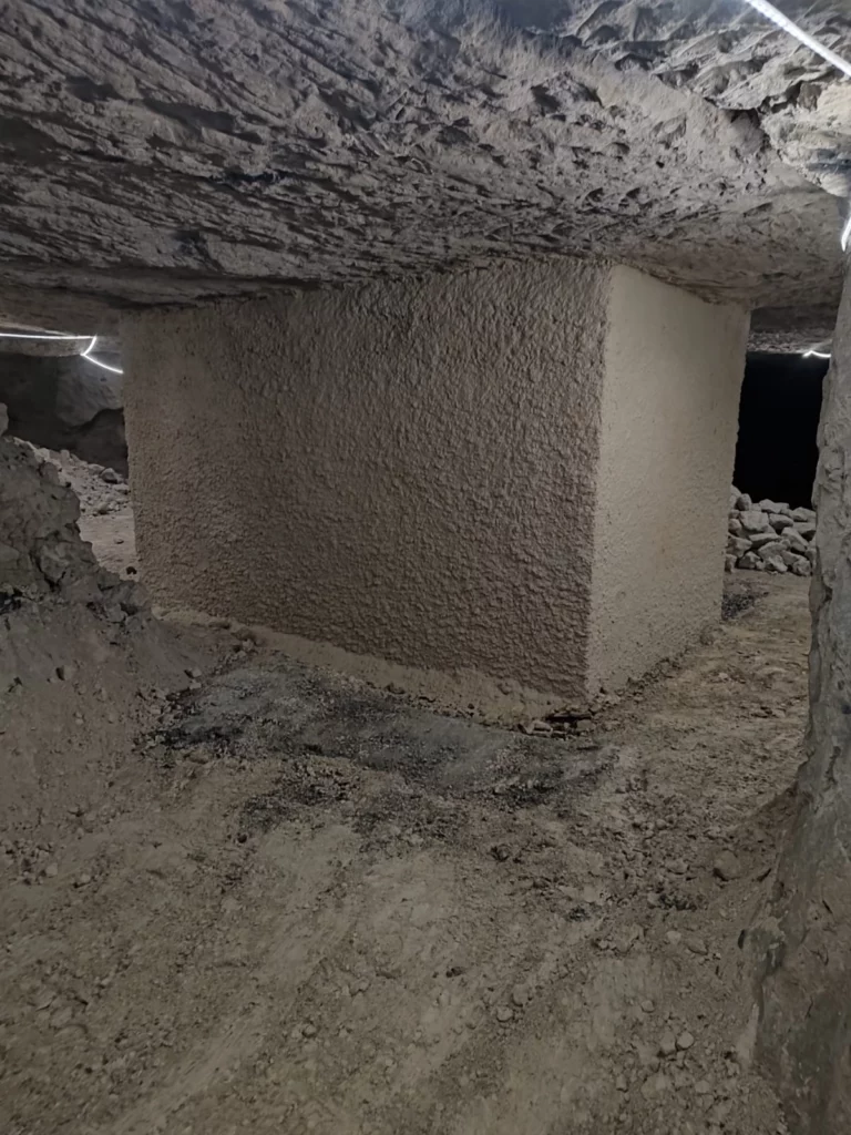 Confortement de cave par construction de pilier 